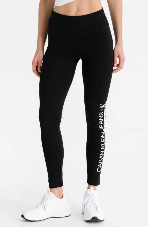 Dlouhé černé legíny Calvin Klein s výrazným nápisem na nohavici